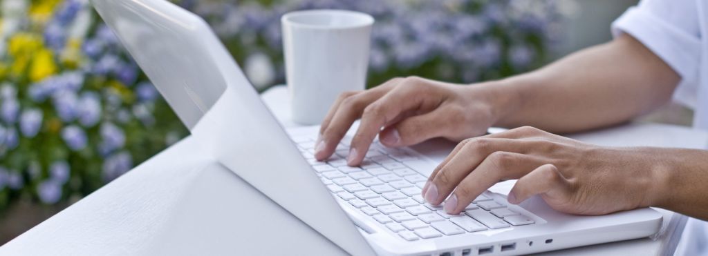 computer-laptop-womans-hands-white-coffee-phone-shutterstock_127332749-e14199951613341.jpg